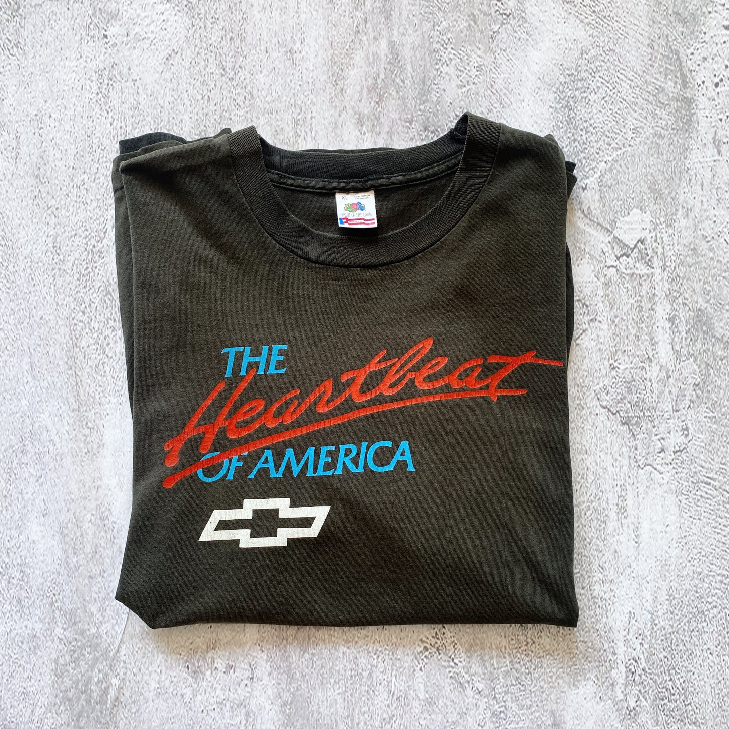 VINTAGE SINGLE STICH THE HEARTBEAT OF AMERICA TEE-1990'S SIZE XL